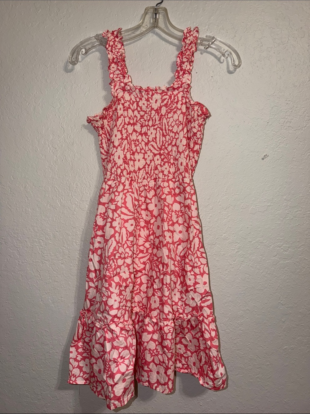 pink and white floral smocked sundress from the boutique brand Versona